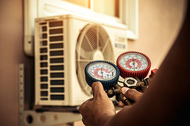 Professional Ac Installation technician working in Forest City, IA